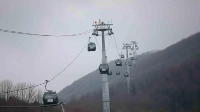 Kocaeli'de hava sıcaklıklarının düşmesiyle Kartepe zirvesi beyaza büründü; teleferikle Kuzuyayla'ya